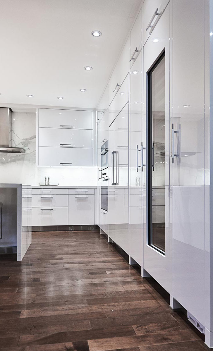 Modern white kitchen with hi-tech flap fittings in Toronto